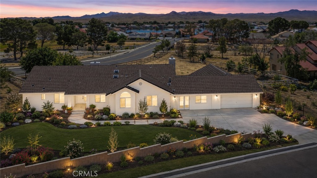 27679 River Rock Road Helendale, CA 92342 - Photo 3 of 65 an aerial view of a house with a garden