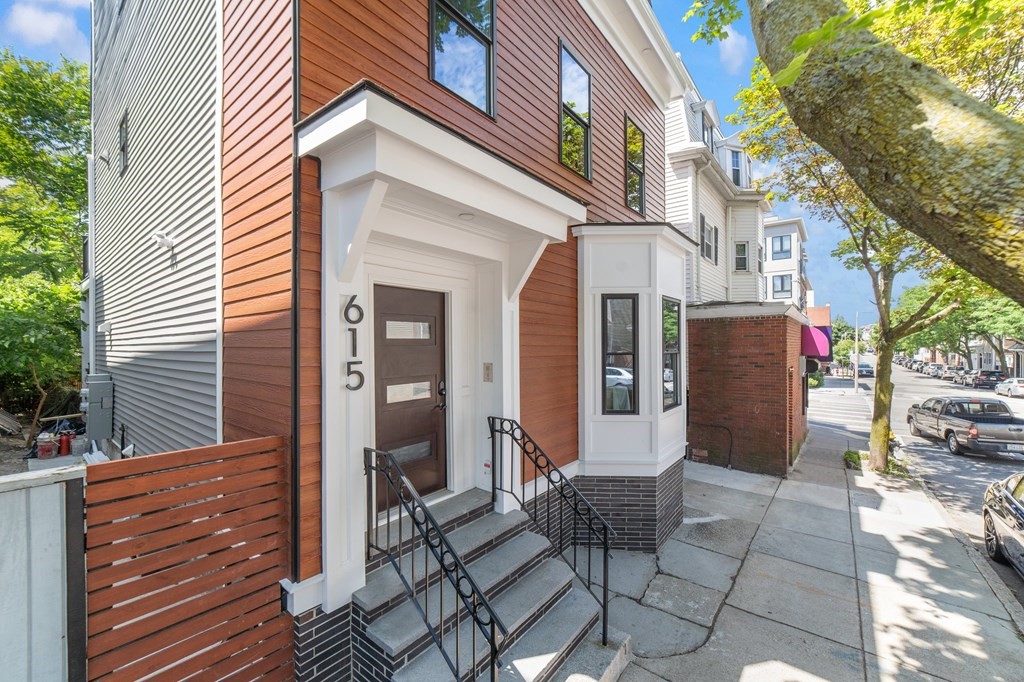 615 East 3rd Street, Unit 1 Boston, MA 02127 - Photo 2 of 42 a view of a patio with table and chairs and potted plants