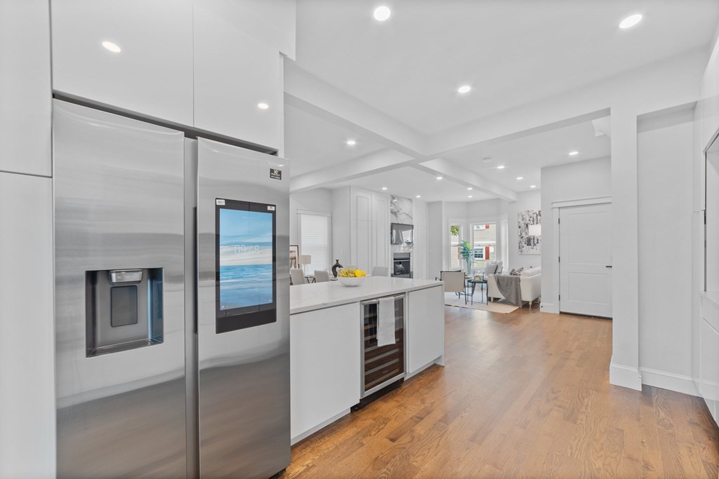 615 East 3rd Street, Unit 1 Boston, MA 02127 - Photo 21 of 42 a kitchen with stainless steel appliances a refrigerator and a oven