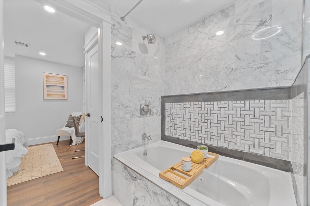 615 East 3rd Street, Unit 1 Boston, MA 02127 - Photo 33 of 42 a bathroom with a sink a toilet and shower