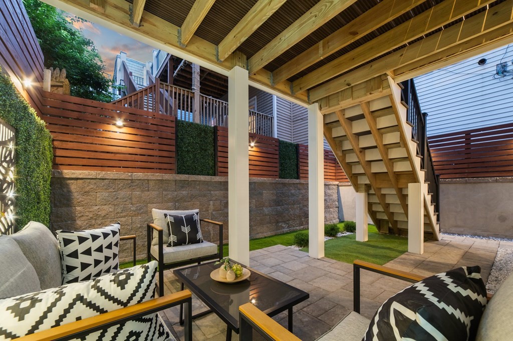 615 East 3rd Street, Unit 1 Boston, MA 02127 - Photo 42 of 42 a view of a patio with couple of chairs and a fire pit