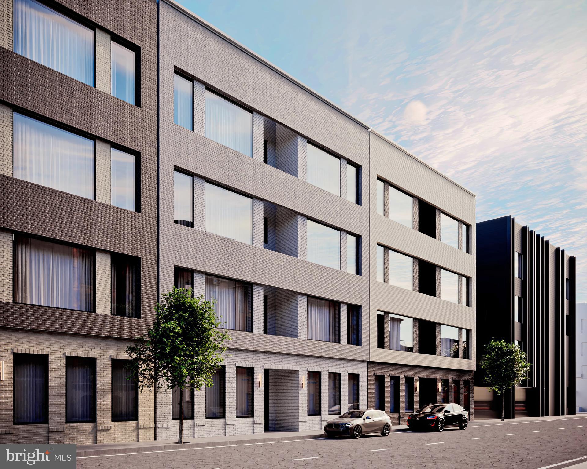 a front view of a building with street view