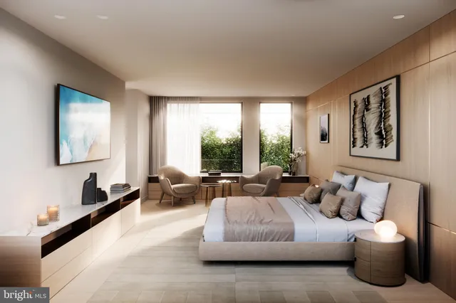 a living room with furniture large window and painting on the wall