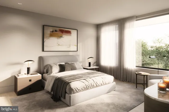 a bedroom with double bed and a large window