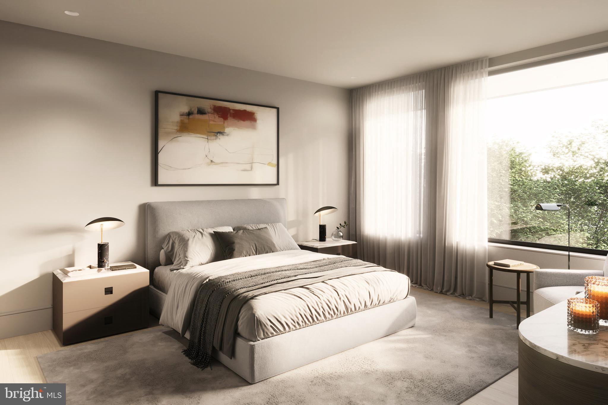 2338 Montrose Street Philadelphia, PA 19146 - Photo 8 of 9 a bedroom with double bed and a large window