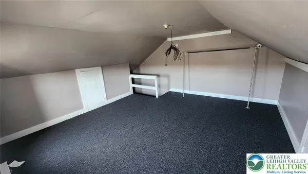 a view of a room with an empty space