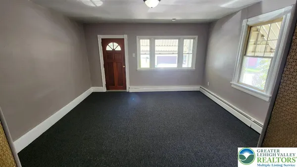 an empty room with windows