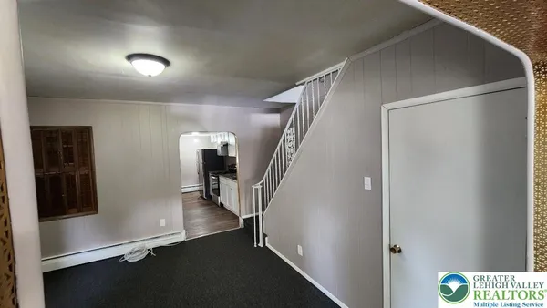 a view of hallway with stairs