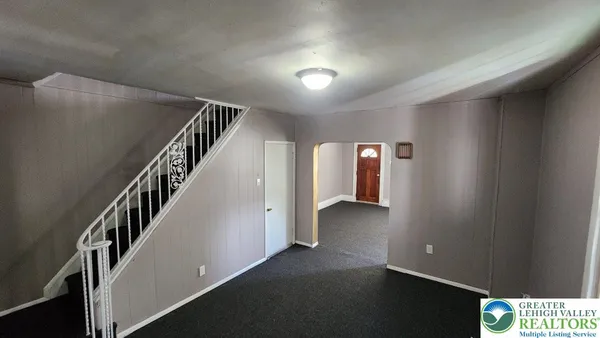 a view of hallway with stairs