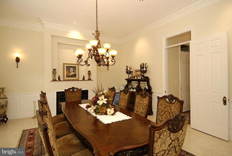 2027 Hunter Mill Road Vienna, VA 22181 - Photo 12 of 30 Dining room with fireplace