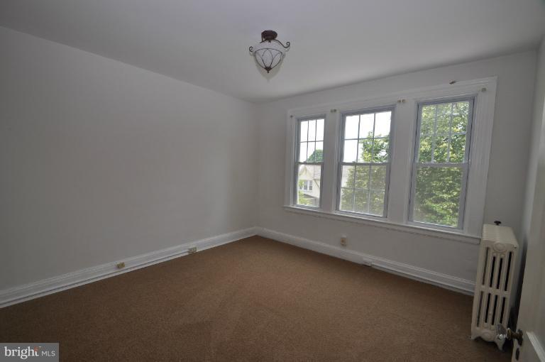 3616 Yolando Road Baltimore, MD 21218 - Photo 1 of 20 an empty room with a window
