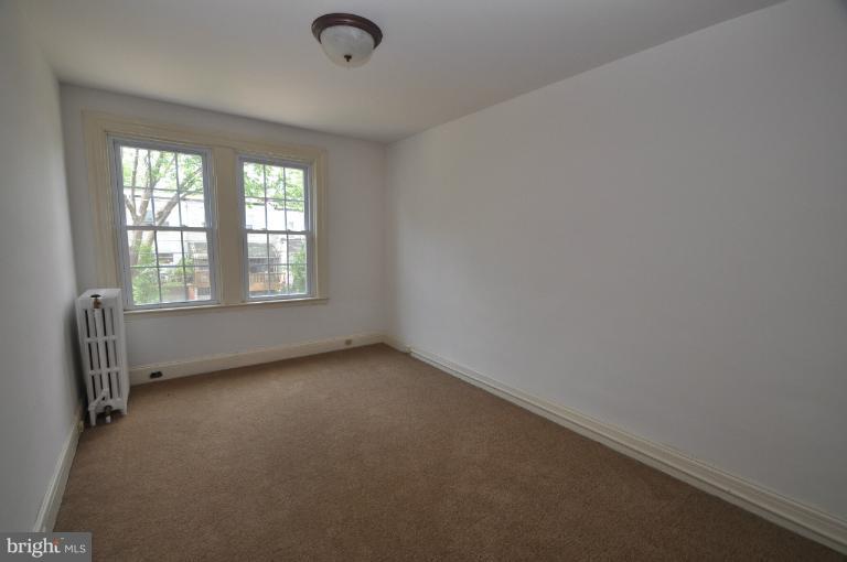 3616 Yolando Road Baltimore, MD 21218 - Photo 13 of 20 an empty room with a window
