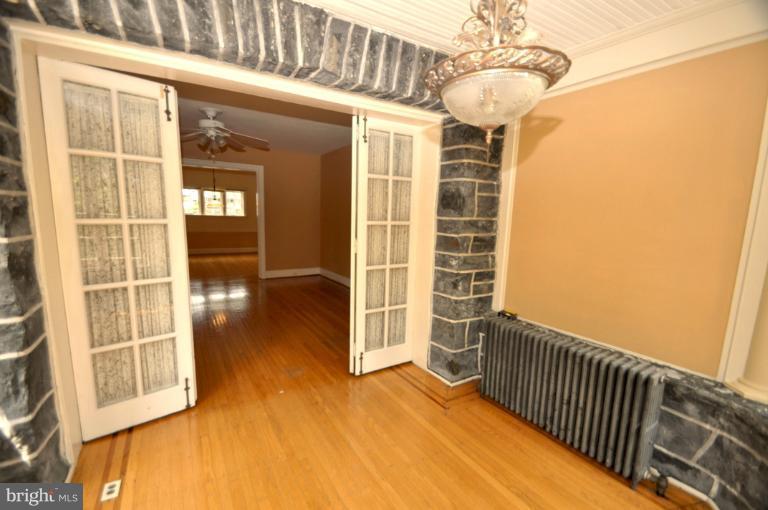 3616 Yolando Road Baltimore, MD 21218 - Photo 17 of 20 a view of a balcony with wooden floor and fence