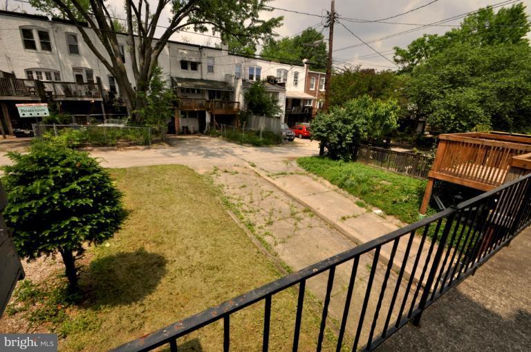 3616 Yolando Road Baltimore, MD 21218 - Photo 9 of 20 a view of a backyard with sitting area