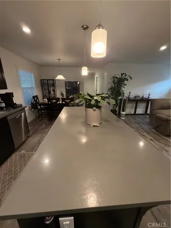 a view of a living room and dining room