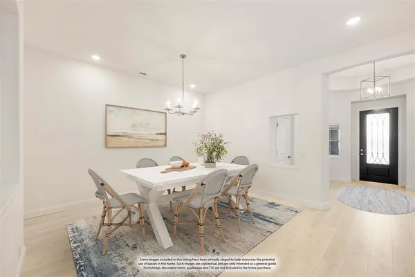 a view of a dining room with furniture