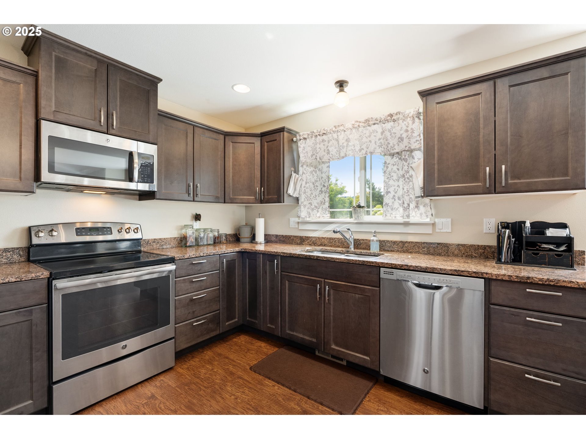 3529 Jones Loop Hood River, OR 97031 - Photo 11 of 39 a kitchen with a sink stove and microwave