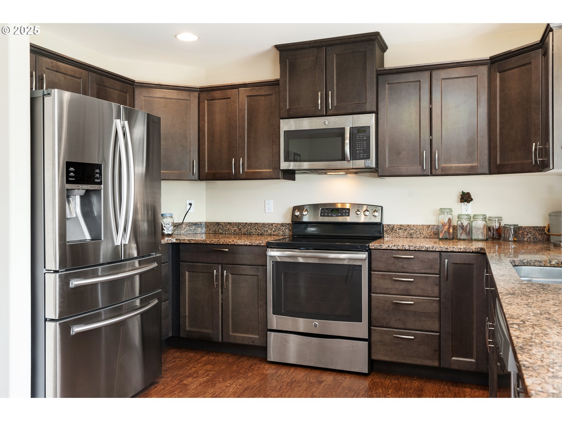 3529 Jones Loop Hood River, OR 97031 - Photo 12 of 39 a kitchen with granite countertop stainless steel appliances and wooden cabinets
