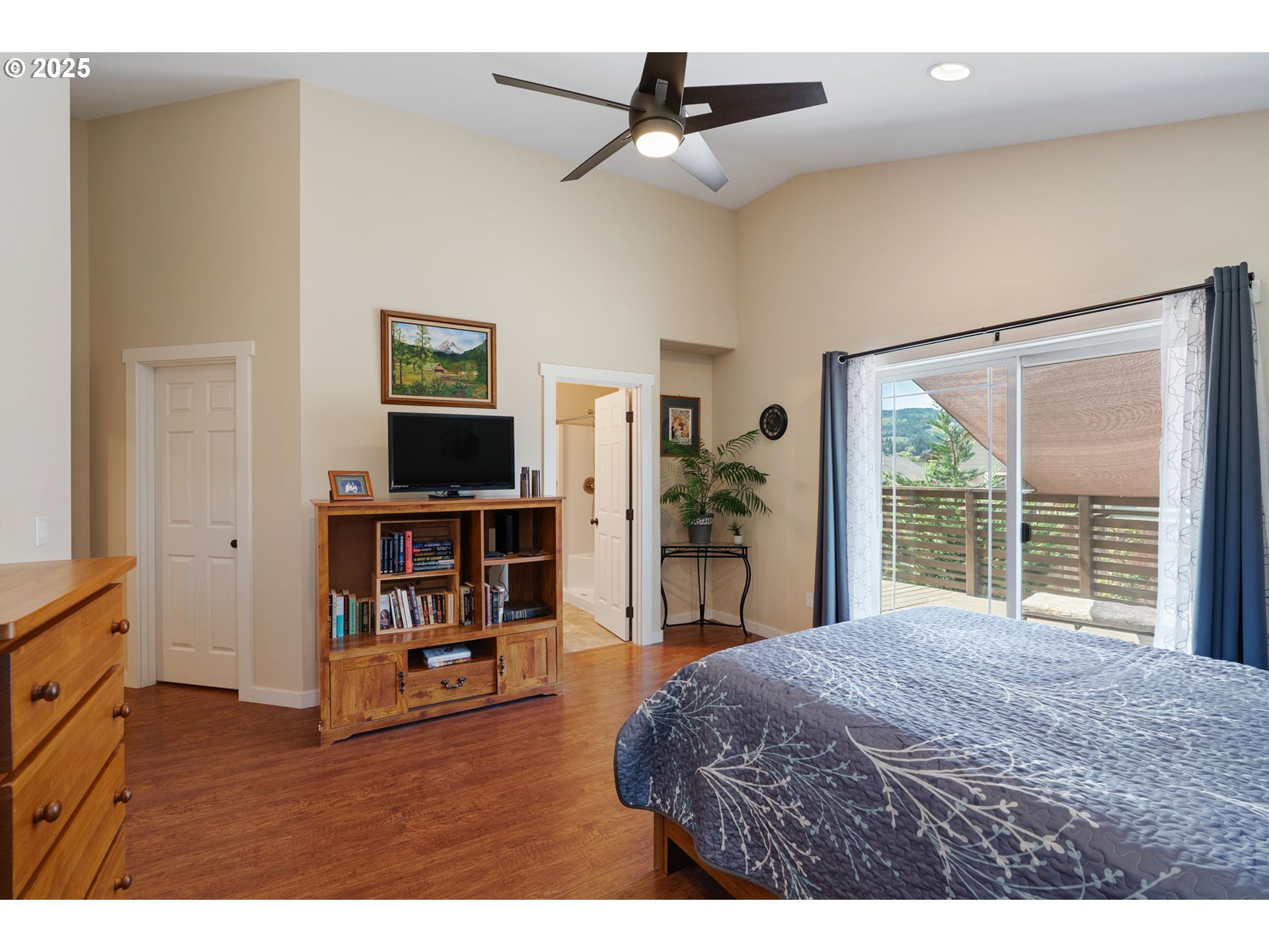 3529 Jones Loop Hood River, OR 97031 - Photo 14 of 39 a living room with furniture and a book shelf