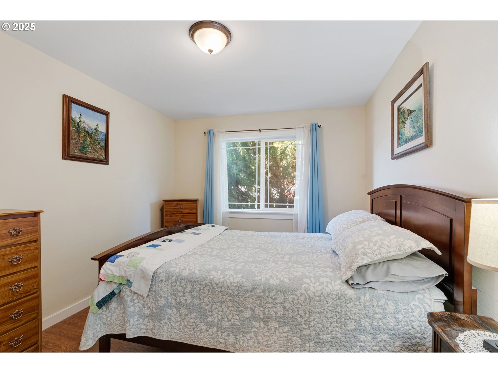 3529 Jones Loop Hood River, OR 97031 - Photo 20 of 39 a bedroom with a bed and a night stand