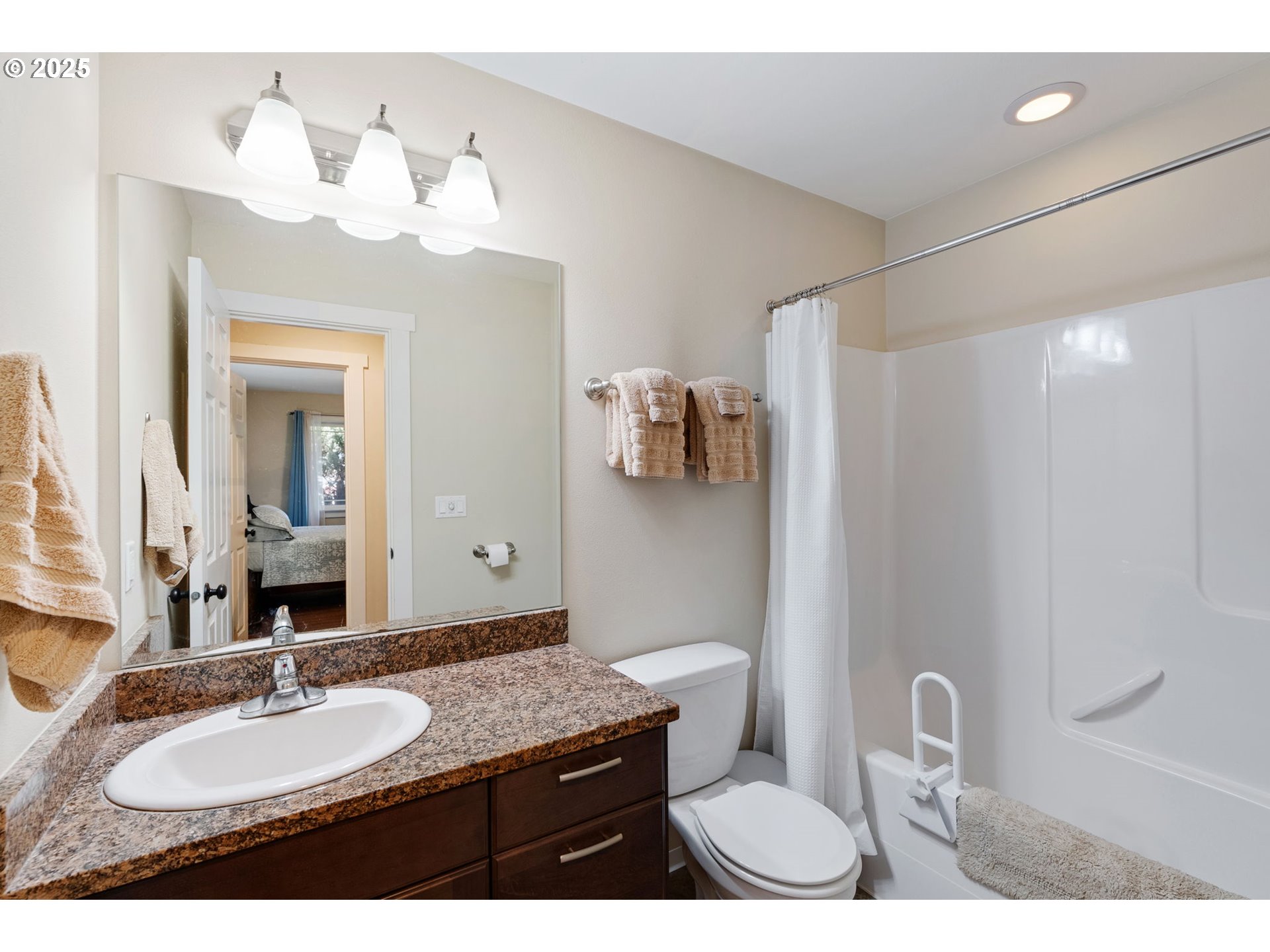 3529 Jones Loop Hood River, OR 97031 - Photo 22 of 39 a bathroom with a granite countertop sink toilet and mirror