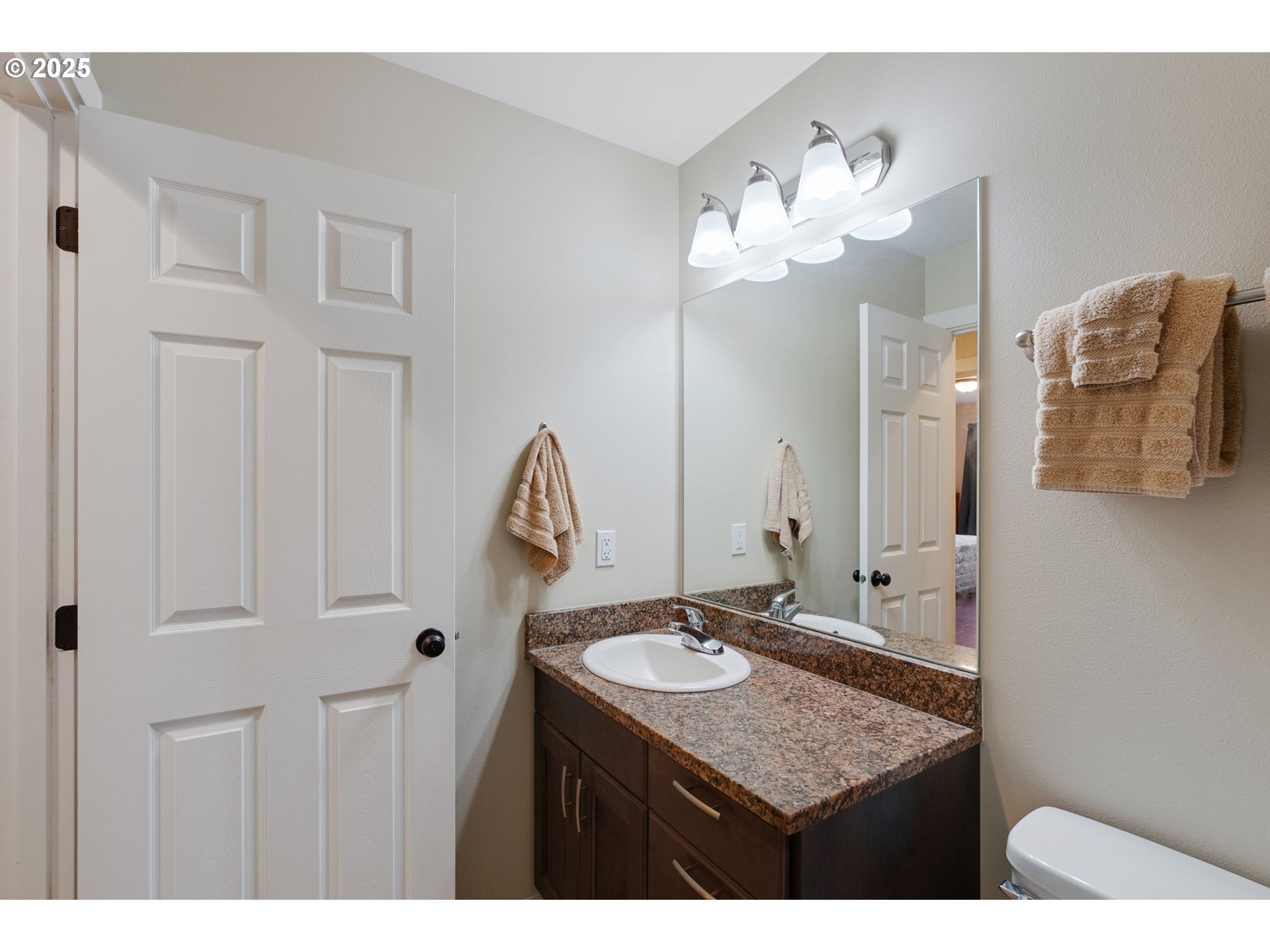 3529 Jones Loop Hood River, OR 97031 - Photo 23 of 39 a bathroom with a sink vanity and a mirror
