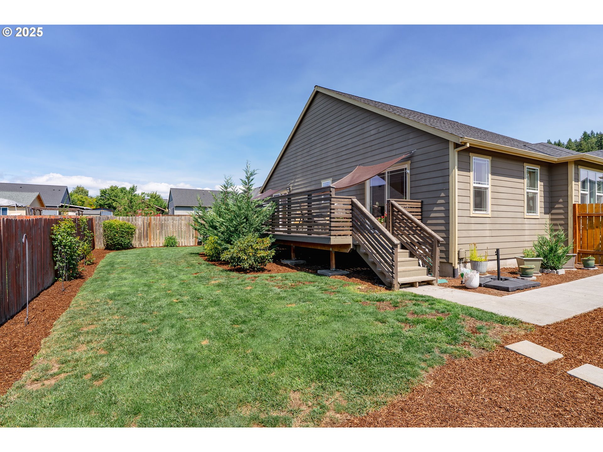 3529 Jones Loop Hood River, OR 97031 - Photo 30 of 39 a view of a house with a yard and sitting area