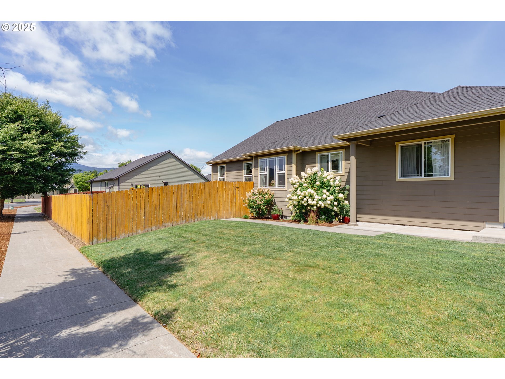 3529 Jones Loop Hood River, OR 97031 - Photo 32 of 39 a front view of a house with garden