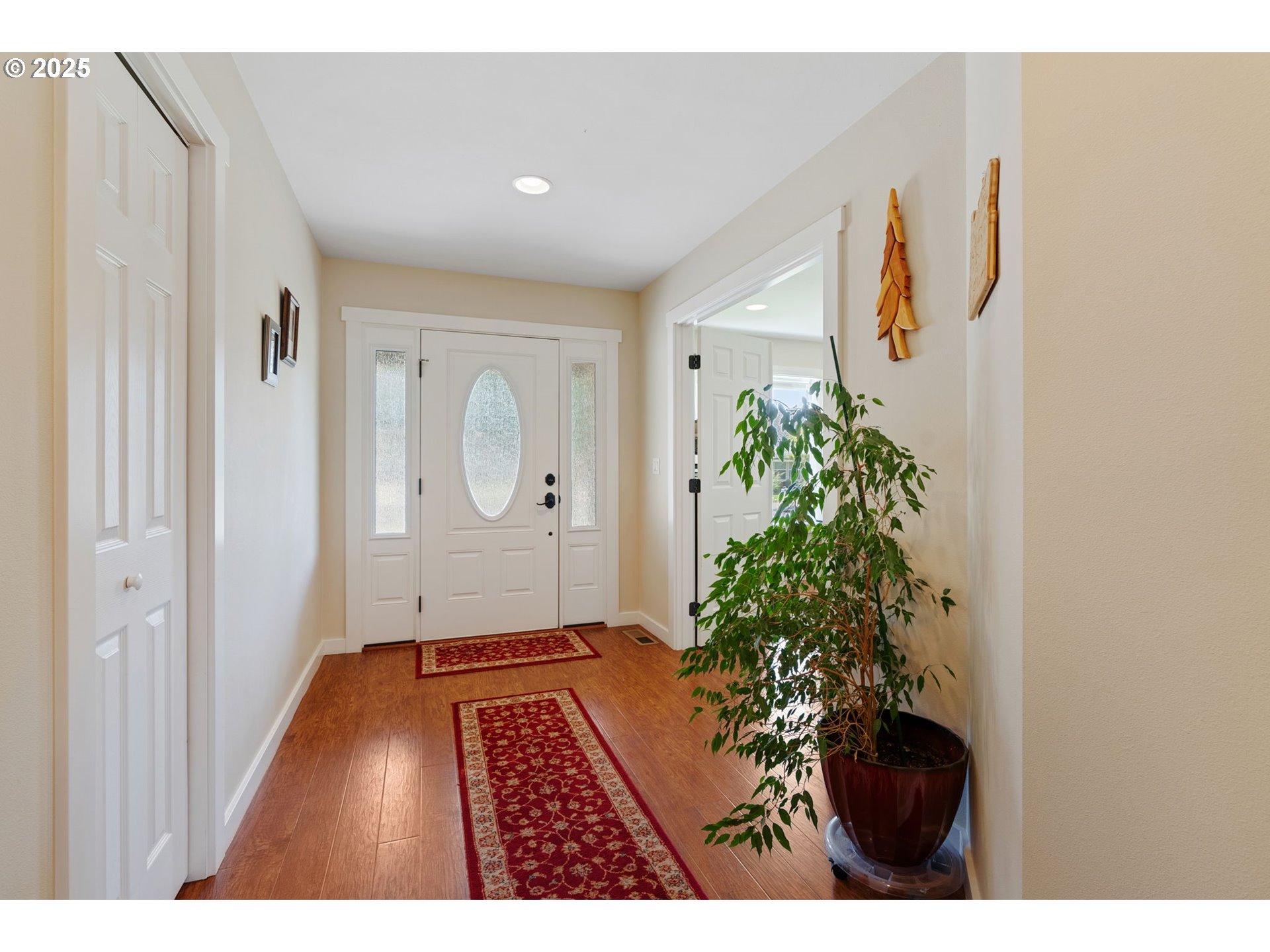 3529 Jones Loop Hood River, OR 97031 - Photo 4 of 39 a view of an entryway with wooden floor