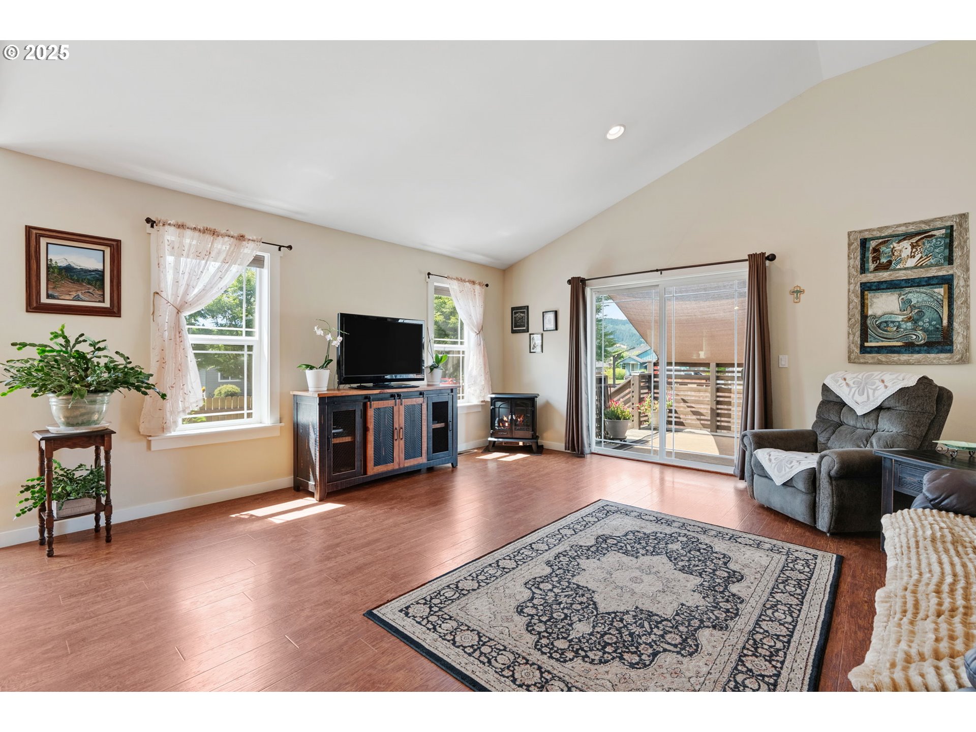 3529 Jones Loop Hood River, OR 97031 - Photo 6 of 39 a living room with furniture and a flat screen tv
