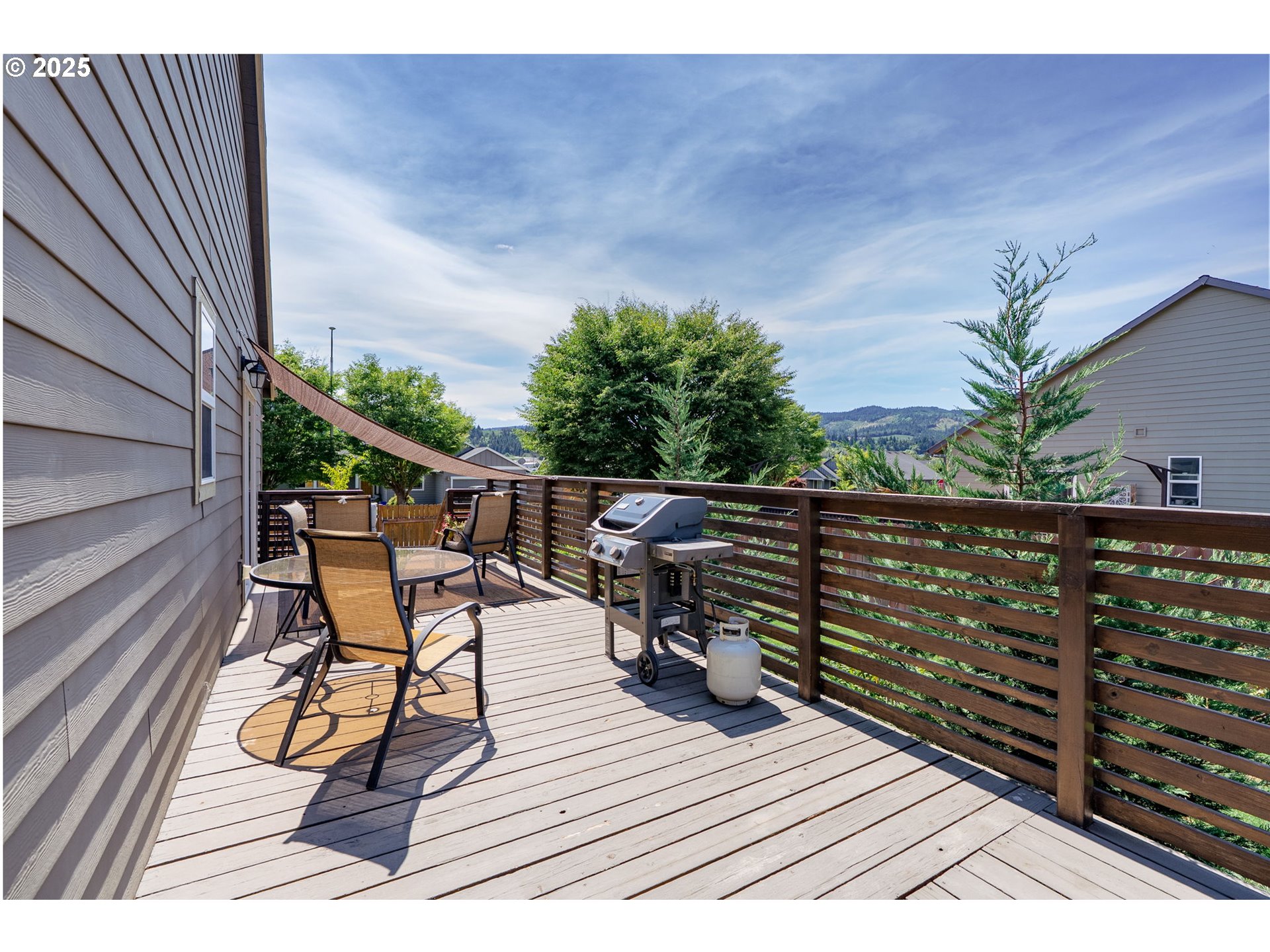 3529 Jones Loop Hood River, OR 97031 - Photo 7 of 39 a view of a roof deck with wooden floor and seating space