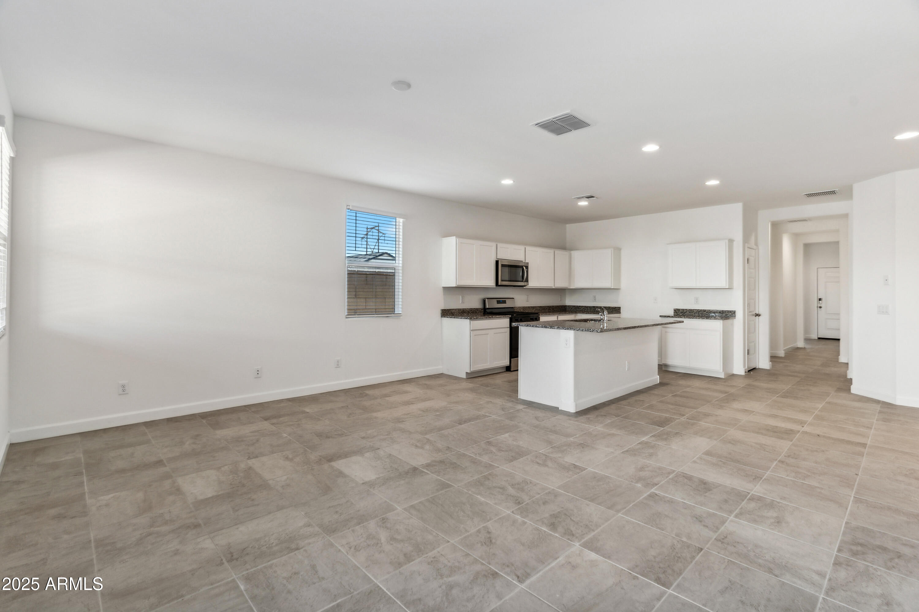 40030 West Agave Road Maricopa, AZ 85138 - Photo 1 of 18 Dove dining room and kitchen