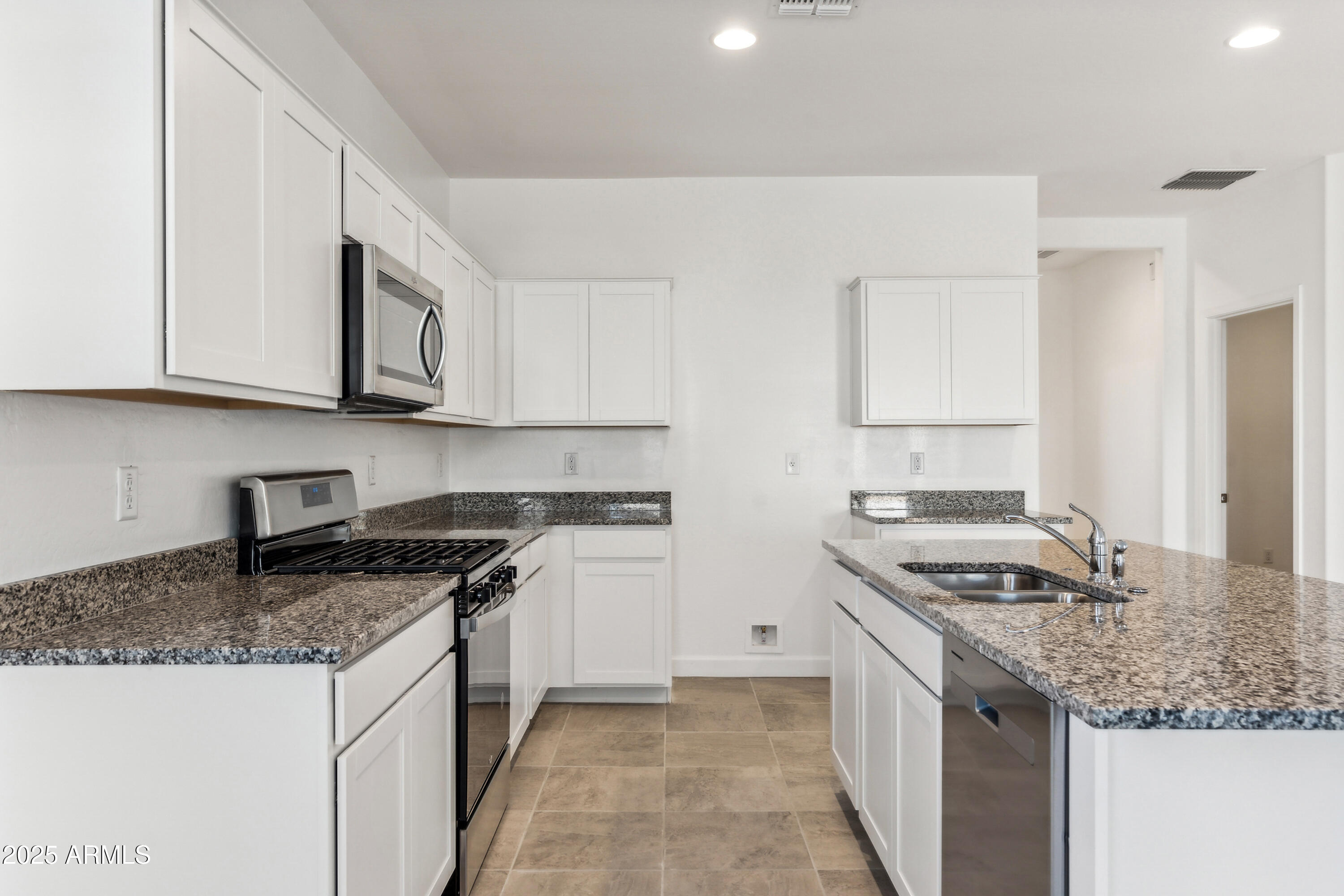 40030 West Agave Road Maricopa, AZ 85138 - Photo 6 of 18 Dove kitchen 2