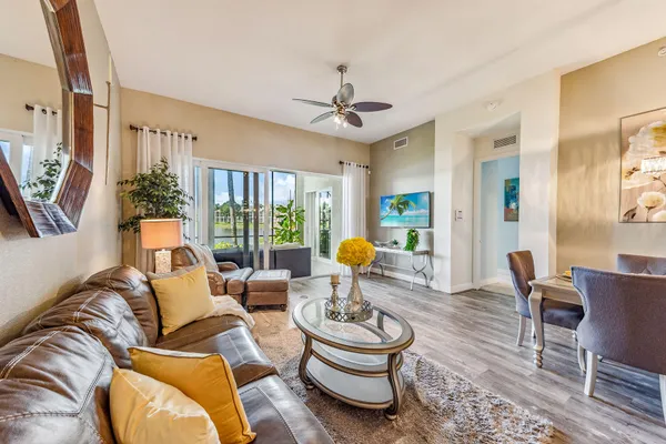 a living room with furniture and a table