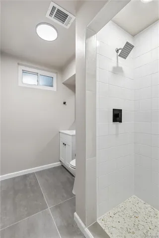 a view of deck with wooden fence and trees