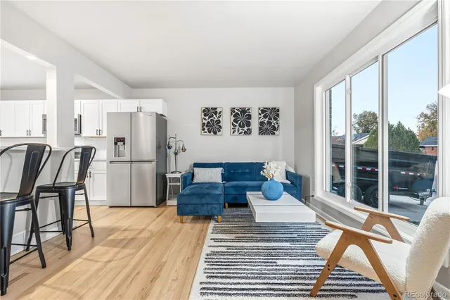 a living room with furniture and a table