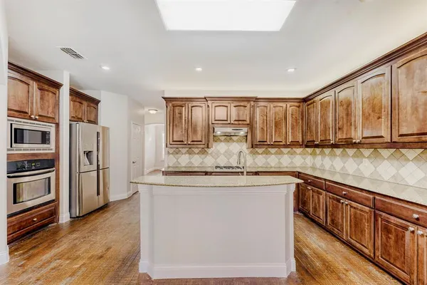 $590,000 | 6911 Bradford Estates Drive, Sachse, TX 75048