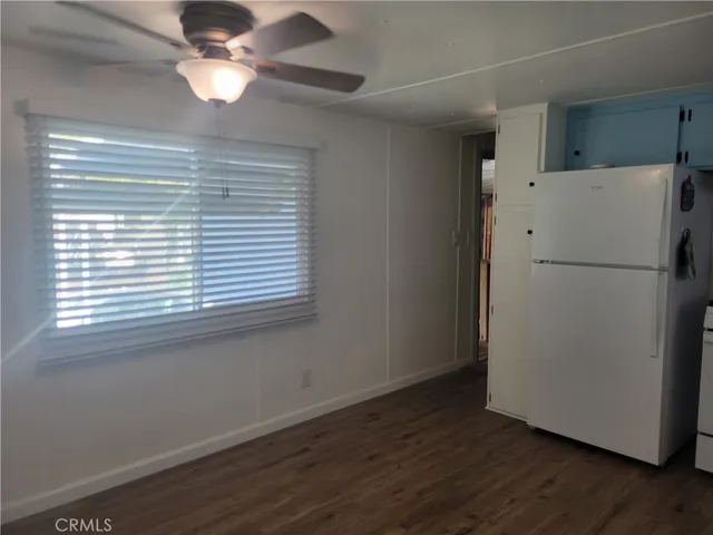 a white refrigerator freezer sitting in a kitchen