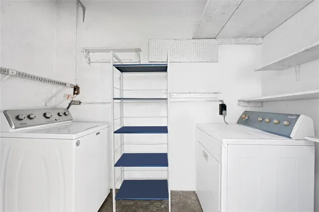 a view of yard with swimming pool and green space