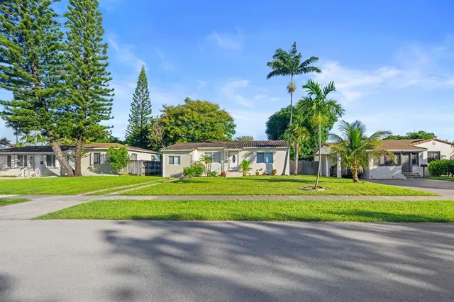 an aerial view of a house with a garden
