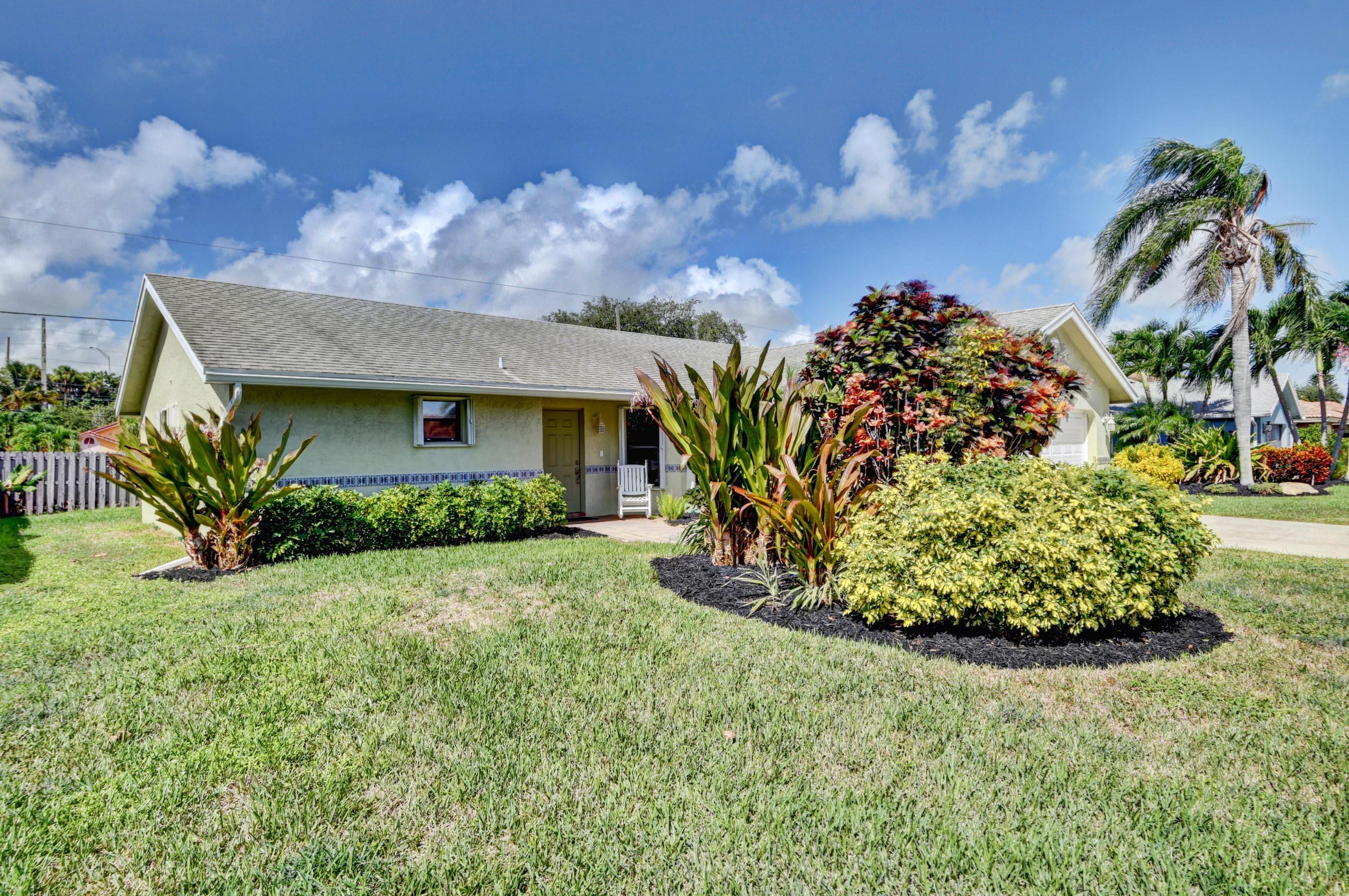 7903 West Country Club Boulevard Boca Raton, FL 33487 - Photo 24 of 32 Front of Home 3rd Angle