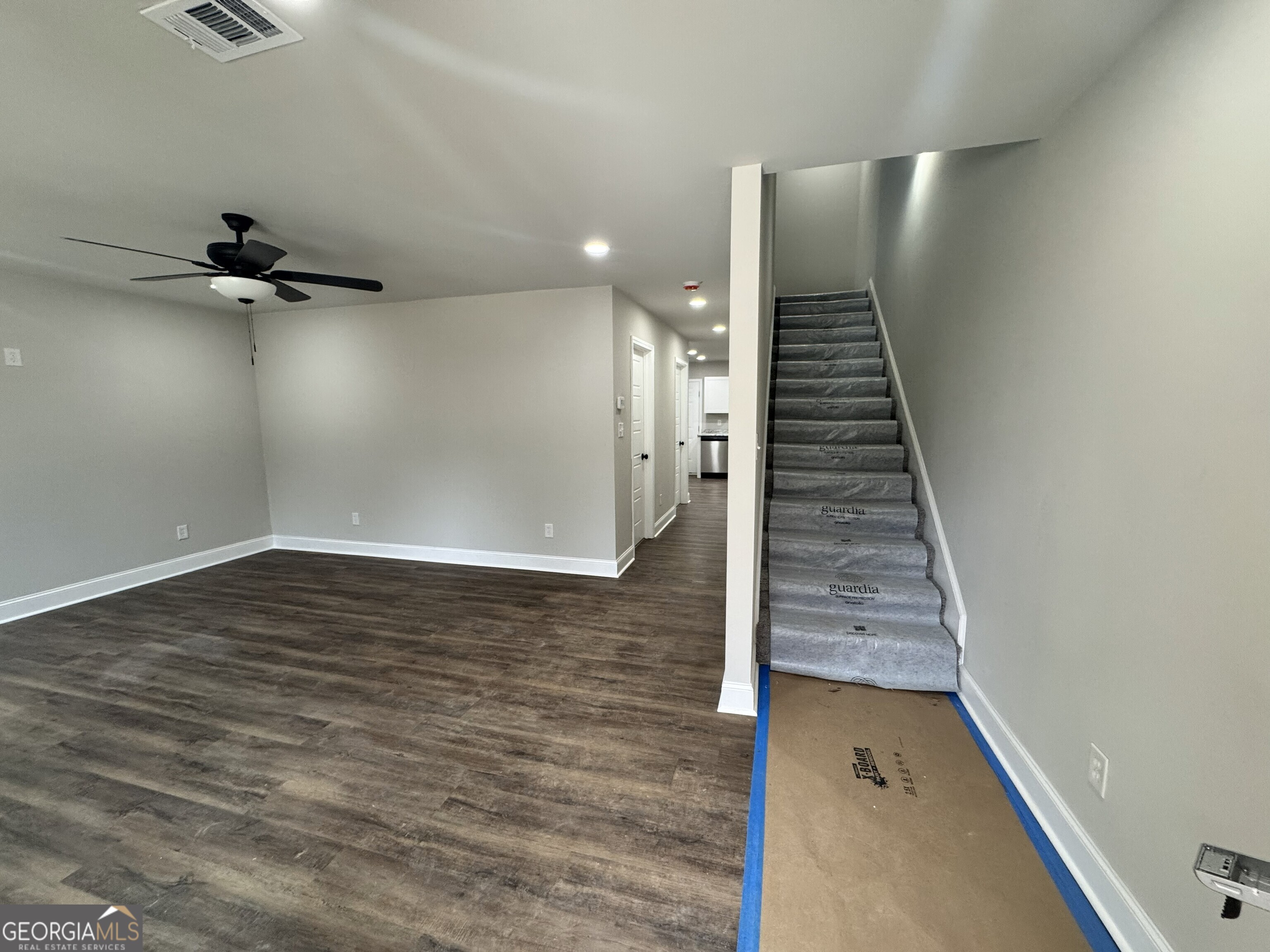305 North 4th Street Warner Robins, GA 31093 - Photo 2 of 17 a view of a room with a staircase