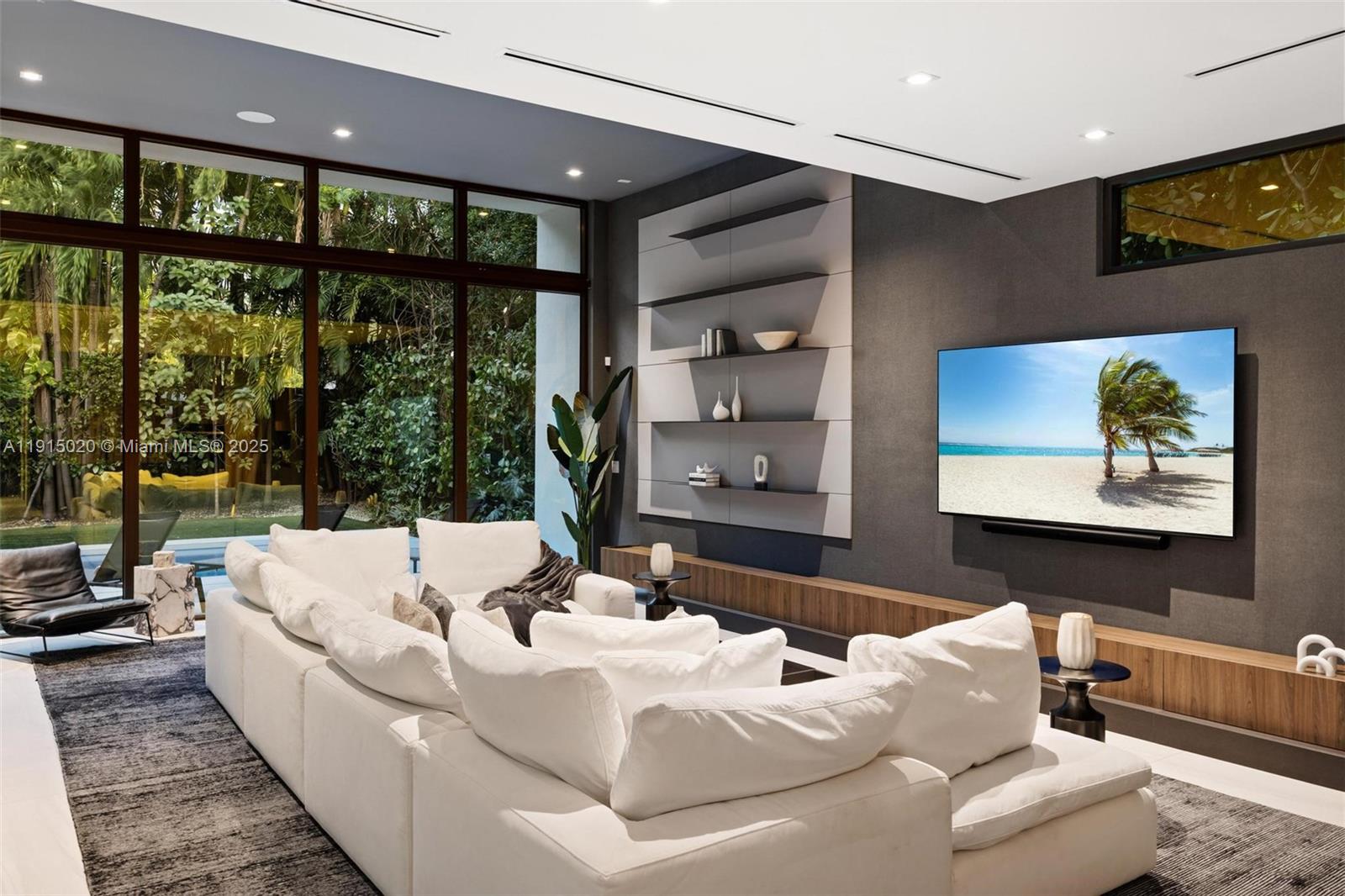 77 Southwest 18th Terrace Miami, FL 33129 - Photo 24 of 90 a living room with furniture and large window