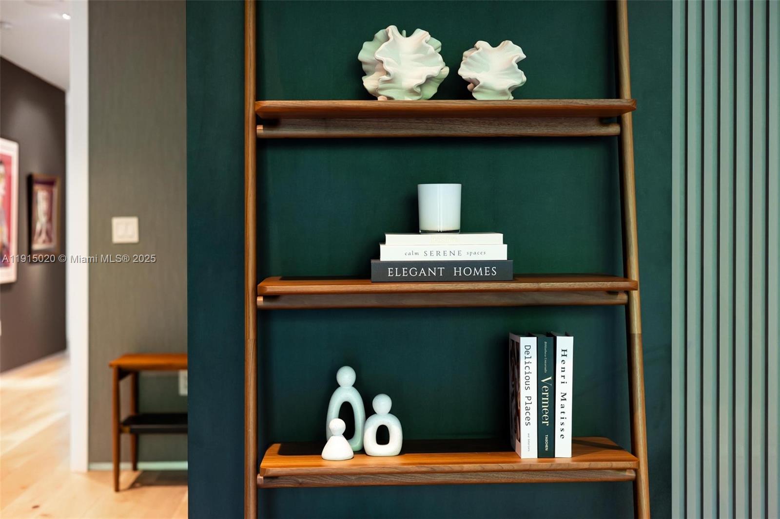 77 Southwest 18th Terrace Miami, FL 33129 - Photo 30 of 90 a front view of a house with entryway and wooden floor