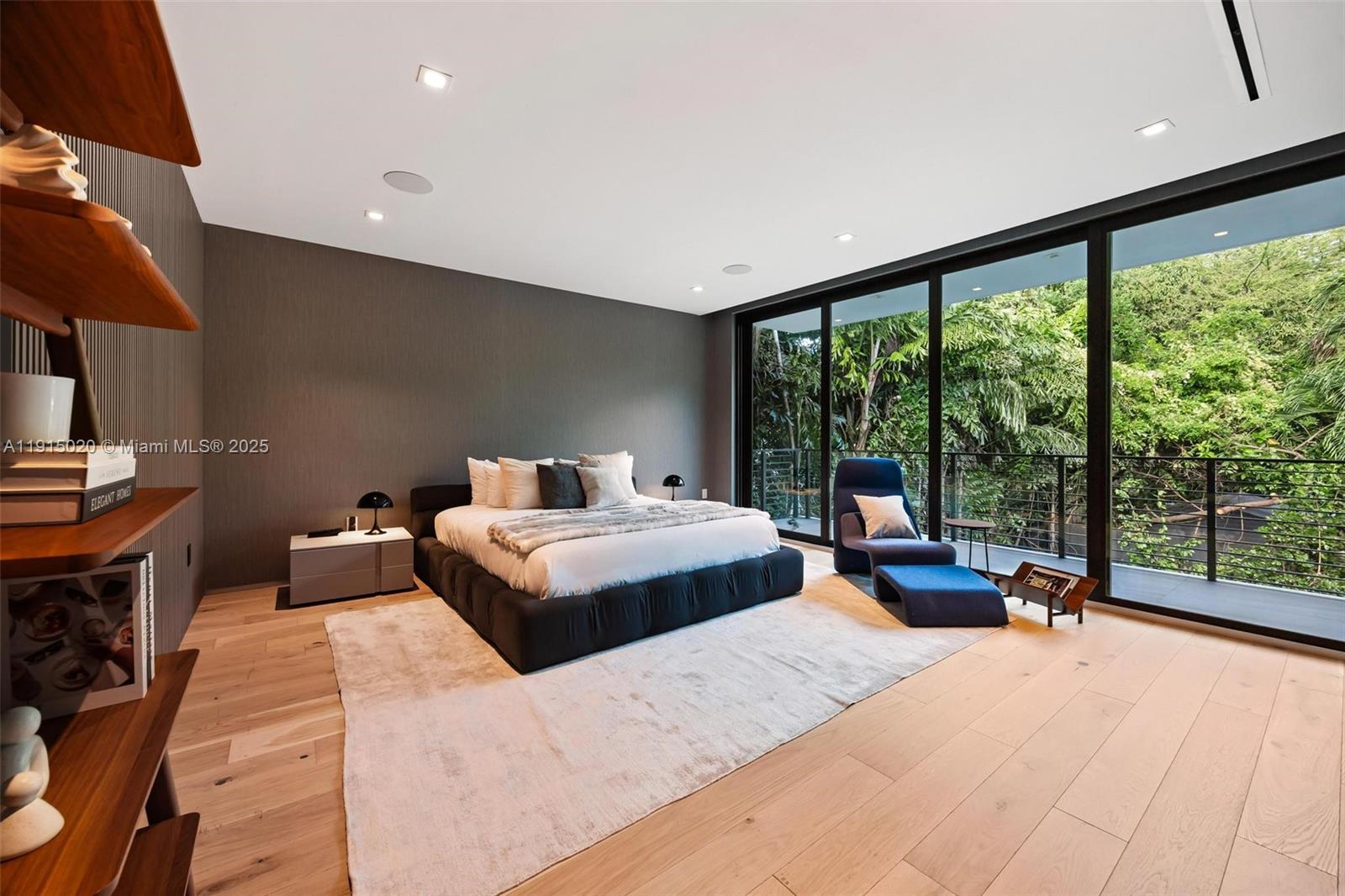 77 Southwest 18th Terrace Miami, FL 33129 - Photo 33 of 90 a bedroom with a large bed and a large window