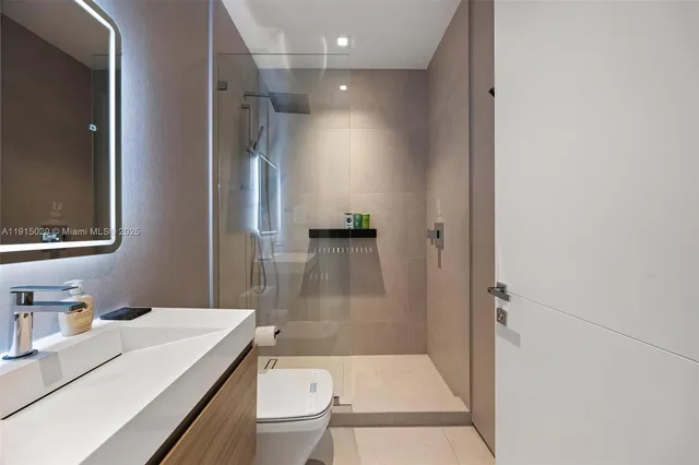 a view of a house with swimming pool and sitting area