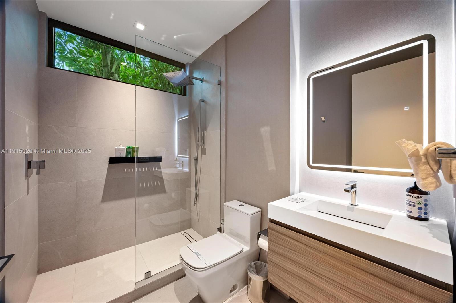 77 Southwest 18th Terrace Miami, FL 33129 - Photo 49 of 90 a bathroom with a sink toilet and shower