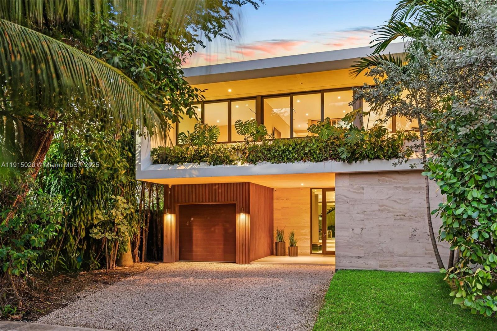 77 Southwest 18th Terrace Miami, FL 33129 - Photo 5 of 90 a view of a building with a porch