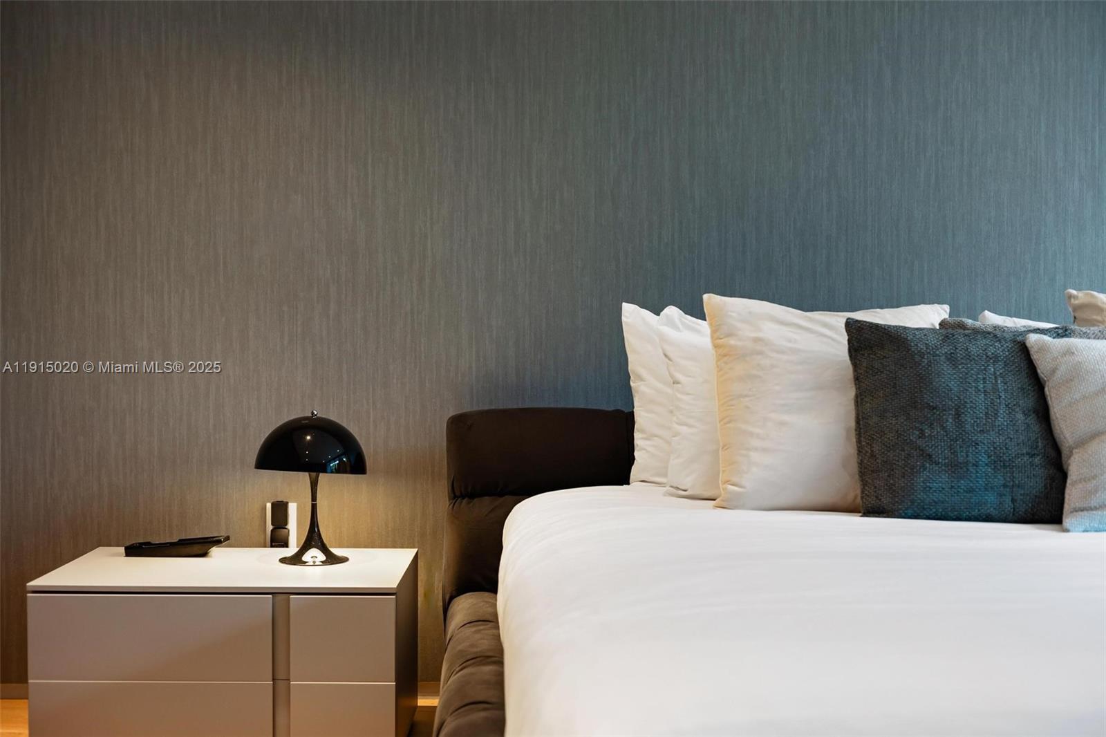 77 Southwest 18th Terrace Miami, FL 33129 - Photo 64 of 90 a bathroom with a sink and a mirror