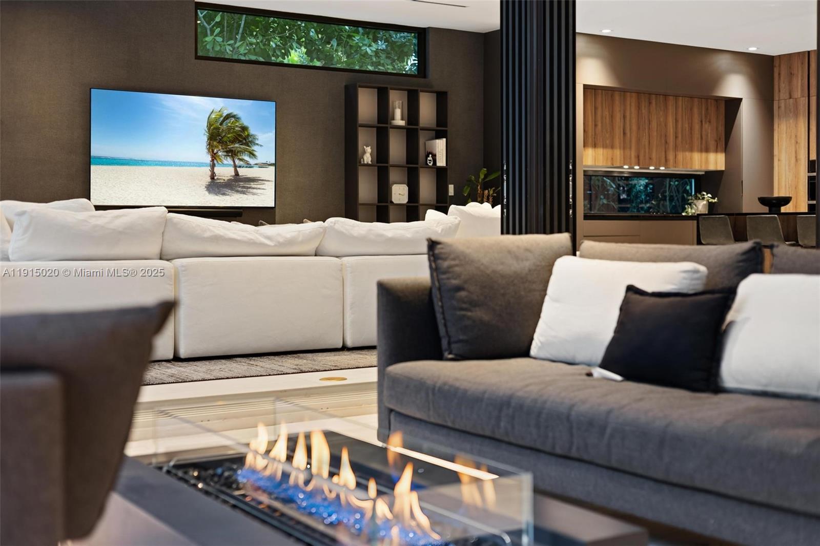 77 Southwest 18th Terrace Miami, FL 33129 - Photo 78 of 90 a living room with furniture and a large window